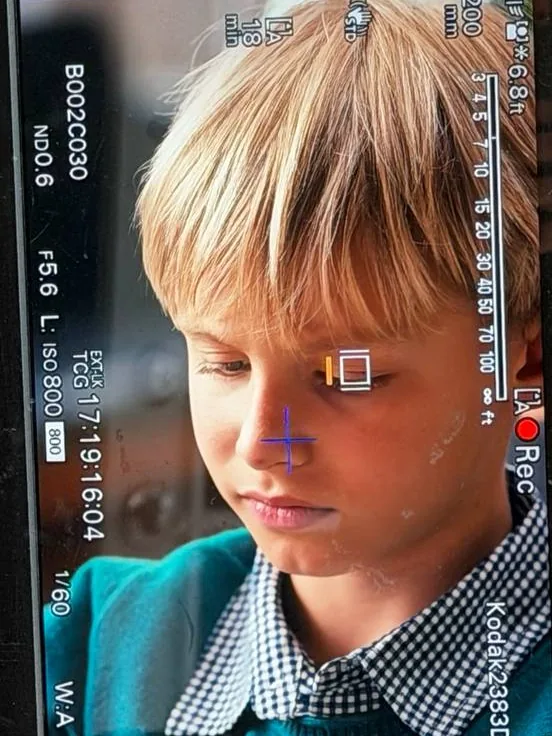 Nicholas delivering a line on set